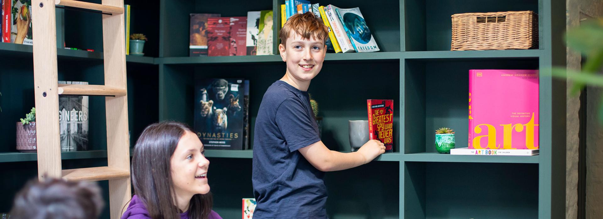 Secondary students in library Ivy Lodge